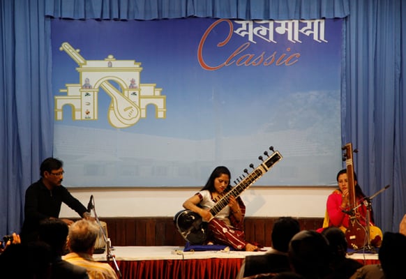 Nepali sitar player Iswari Upreti enthralls the audience at Yalamaya Classic, a monthly musical event in Patan on Tuesday.