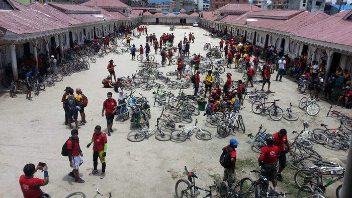 Riders take a break during the fourth annual Kathmandu Kora Cycling Challenge in Boudha on Saturday.