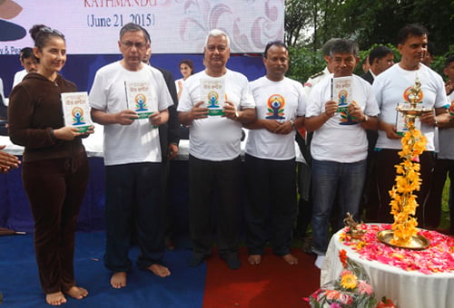 Bollywood Actress Manisha Koirala, Indian Ambassdor Ranjeet Rae, Vice President Parmanand Jha, actors Haribansha Acharya and Madan Krishna Shrestha (from left) celebrate Yoga Day in Kathmandu Sunday.