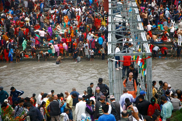 Devotees gather on the bank of Bagmati River at Gokarna Temple in Kathmandu on Monday to celebrate Kuse Aunsi (Father's Day). Kuse Aunsi is a Hindu festival in which fathers are honored.