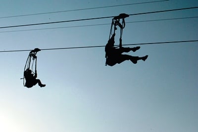 UP IN THE AIR: Tourists enjoy Zip-lining at Hemja in Pokhara on Saturday.