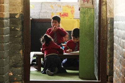 SILENCE PLEASE: Young students take exams in a school classroom in Bungamati, Lalitpur, on Wednesday.