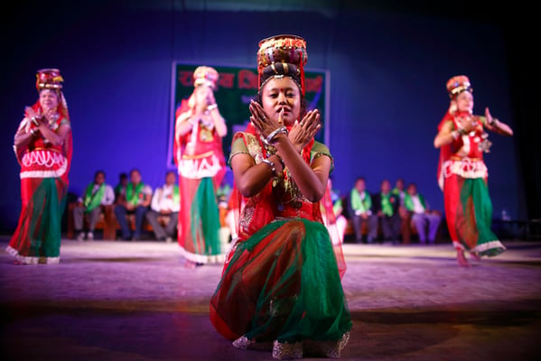 Women from Tharu community dressed in customary attire perform dance during the Jitiya festival in Kamladi, Kathmandu on Wednesday.
