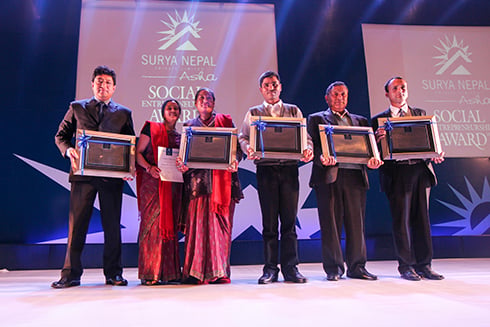 WON IT: Suman Shakya, Bhattedanda Women Farmers Cooperative, Madhukar KC, Prem Bahadur Lama & Dipak Prasad Koirala (l to r), winners of Surya Nepal Asha Social Entrepreneurship Award receive their certificates in Kathmandu on Friday.
