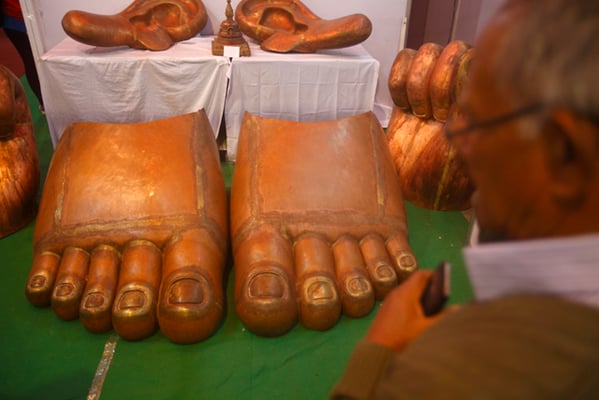 A man observes a statue at the 14th Handicraft Trade Fair and 12th Craft Competition 2016 in Bhrikutimandap on Tuesday.