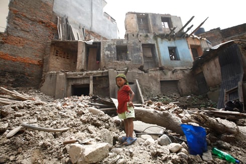 ALL FALL DOWN: A girl plays near demolished houses in Lajimpat that were brought down during Kathmandu's road expansion project.