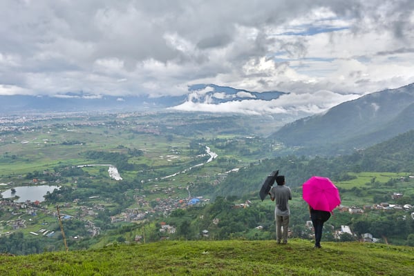 Rain clouds hang over Kathmandu valley as seen from a hill atop Chalnakhel on Saturday evening.