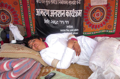 YES I CAN: Sharada Bhusal who has been fasting in protest against corruption for the past one week at Shanti Batika in Ratnapark lays down to rest.