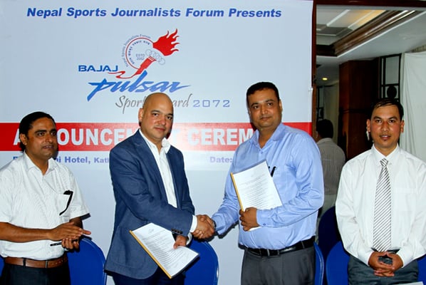 Shekhar Golchha of the Golchha Organisation and President of Nepal Sport Journalist Forum Mahesh Acharya at the press meet of NSJF Pulsar Sports Award 2016 in Durbar Marg, Kathmandu on Sunday.