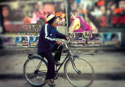 TRYING HARD: Despite the chilly temperature, a man rides his bicycle early in the morning near Darbar Marg.