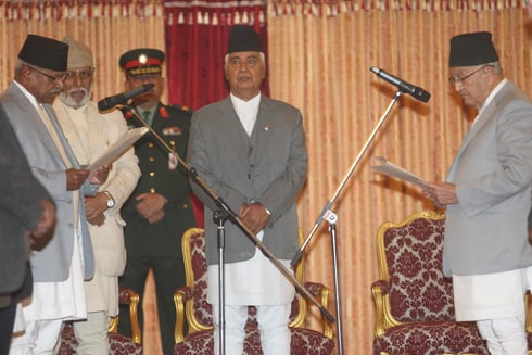 NEW ROLE: President Ram Baran Yadav (left) administers oath to the eldest Constituent Assembly (CA) member Surya Bahadur Thapa at Sheetal Niwas, Maharajgunj on Monday.Thapa will chair the first CA meet on Wednesday.