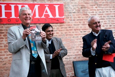 THIS IS IT: Norwegian ambassador to Nepal Alf Arne Ramslien (left) shows a copy of the book-format print quarterly Southasian launched at Yalamaya Kendra on Friday.