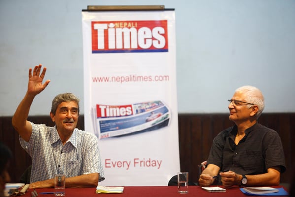 Journalist Prabhu Ghate talks about his book 'By Thumb, Hoof and Wheel' at Yalamaya Kendra on Friday.