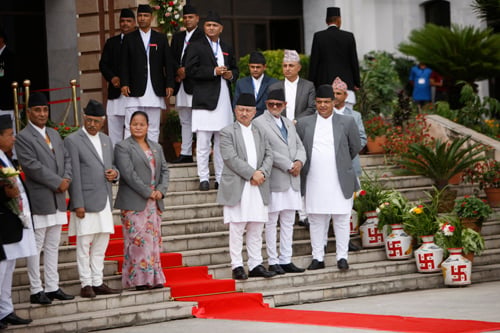Prime Minister Sushil Koirala and Speaker Subhas Nembang wait for President Ram Baran Yadav outside Parliament on Wednesday. President Yadav unveiled the government's policies and programs.