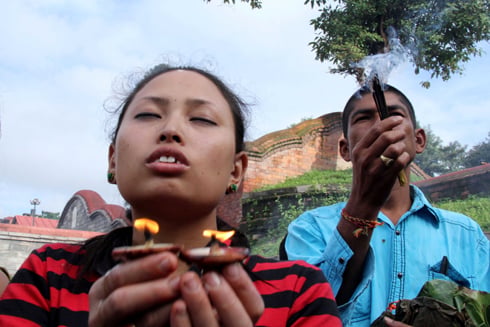 JAI SAMBHO: Hindu devotees offer prayer to Lord Shiva at Pasupatinath temple on Monday afternoon. The month of Shrawan is considered auspicious in the Hindu calendar.
