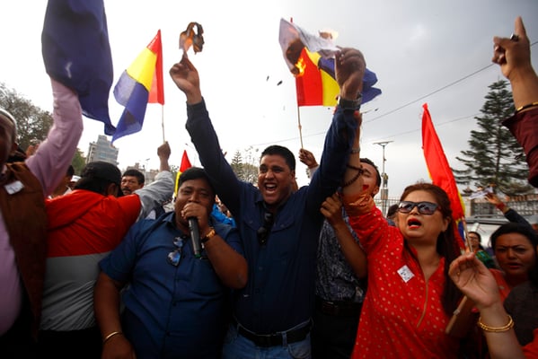 Supporters of Rastriya Prajatantra Party burn copies of the letter issued by the Election Commission (EC) in Ratnapark on Tuesday. The EC, through this letter, had informed the party that its agenda of Hindu monarchy was against the Constitution.