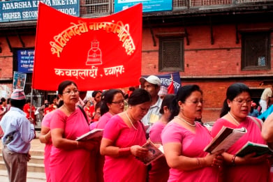 LOCAL SINGERS: Women in a singing procession chant Lord Buddha’s name near Krishna temple in Patan on Thursday.