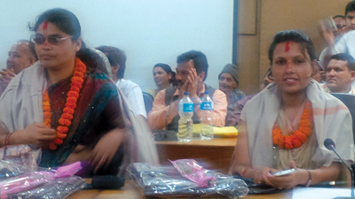 COMMUNITY PRIDE: Kalpana Chapagain (left) of Radio Didi Bahini and Khem Kumari Pokhrel of Radio Mukti are conferred the National Media Award.
