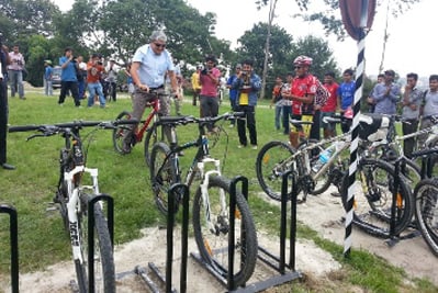 ENVIRONMENT DAY: Ram Kantha Makaju vice chancellor of Kathmandu University rides a bicycle during the inauguration of cycle stands at main campus on Wednesday.