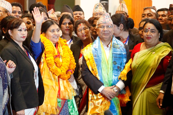 After becoming Nepal's first female President, Bidya Bhandari greets her supporters in Parliament on Wednesday.