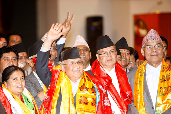 KP Sharma Oli waves after being elected the 38th Prime Minister of Nepal on Sunday. Oli secured 338 votes as against Sushil Koirala’s 249 votes.