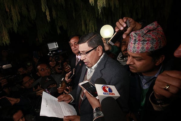 Maoist leader Narayan Kaji Shrestha briefs journalists about a 7-point unification deal between CPN (UML) and CPN (Maoist-Centre) at Baluwatar on Monday night. The deal is silent about who will lead the unified party, and whether UML Chair KP Oli and Maoist Chair Pushpa Kamal Dahal will take turns to be Prime Minister.