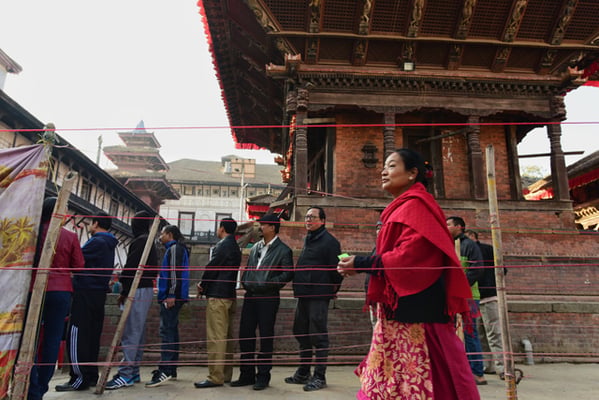 Citizens of Kathmandu-3 line up to cast their ballots during the last phase of parliamentary and provincial elections on Thursday. More than 12 million voters in 45 districts are eligible to exercise their voting rights in the second phase of the polls.