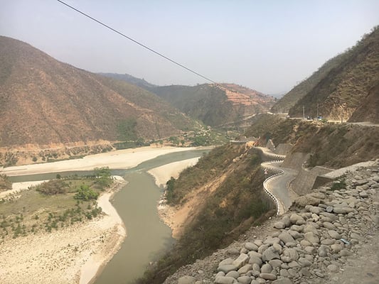The bypass road above a section of BP Highway that collapsed in March at the confluence of the Tama Kosi and Sun Kosi in Sindhuli on Saturday.