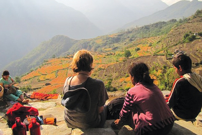 BUCOLIC AND BEAUTIFUL: A tourist enjoys the scenery near Machim village with locals.