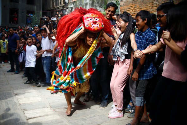 Laxman Ranjit performs the Lakhe dance, on the first day of the Indra Jatra Festival at Hanuman Dhoka on Sunday. The eight-day festival celebrates Indra, the king of gods and rain. Kumari, the living goddess, is also taken around parts of the capital city during the festival.