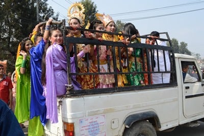 SQUEEZE: Girls are transported to the stage where they will dance honouring Lord Shiva on the occasion of Shivaratri festival in Pashupatinath on Sunday.