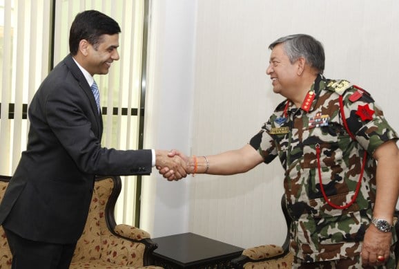 Nice to meet you: Chief of Nepal Army Gaurav Shumsher Rana (right) greets United Nations Under Secretary-General Gyan Chandra Acharya (left) at the army headquarters in Bhadrakali on Wednesday.
