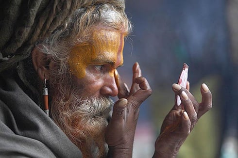 AU NATUREL: An ascetic applies herbal make-up to prepare for Shiva Ratri at Pasupatinath.