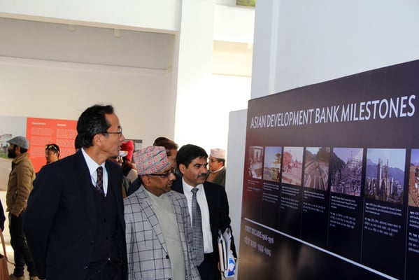 Kenichi Yokoyama, Asian Development Bank Country Director for Nepal and Shanta Raj Subedi, Secretary, Ministry of Finance during the launch of the photo exhibition to commemorate 50 years of Nepal-ADB partnership.