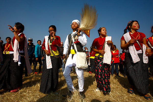 People from the Kirat community dance the "Sakela" to celebrate Udhauli festival in Tundikhel on Saturday. Udhauli is an annual festival celebrated by the Kirat community of eastern Nepal to mark the migration of animals and birds to lower altitude regions.