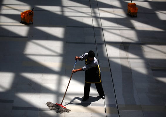 A janitor at work in the recently opened LABIM Mall in Pulchowk on Friday.