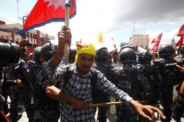 A pro-Hindu activist attempts to break into the restricted area at New Baneswor, Kathmandu on Monday during a rally organised by Nepali Congress leader Khum Bahadur Khadka.