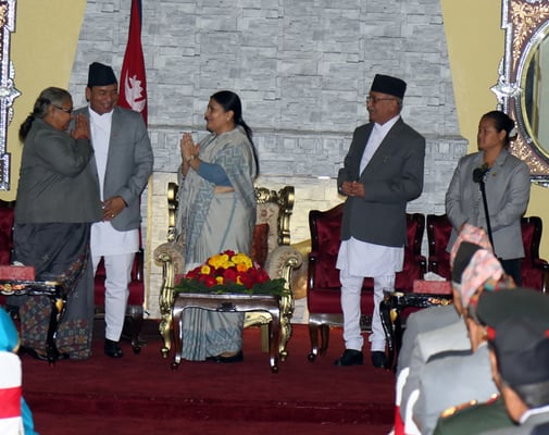 President Bidya Bhandari administers oath of office and secrecy to newly appointed Chief Justice Sushila Karki at Shital Niwas on Monday. Also seen in the picture are Prime Minister KP Oli and Speaker Onsari Gharti Magar.