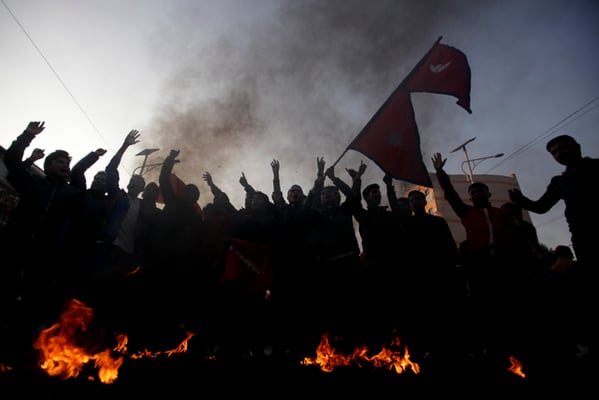 All Nepal National Free Students Union (ANNFSU) and Youth Association Nepal (YAN) burn tyres to protest against registration of the second constitution amendment bill in Parliament at New Baneshwor on Wednesday. The bill proposes readjustments to provincial boundaries.