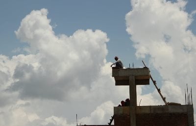 UP IN THE AIR: A labourer works unharnessed while working on the construction of a building in Golkopakha, Samakhusi, on Wednesday.