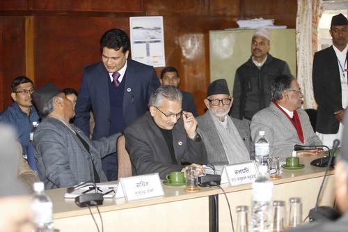 Chair Baburam Bhattarai with Prime Minister Sushil Koirala at the Constitutional-Political Dialogue and Consensus Committee meeting in Singha Darbar on Sunday.