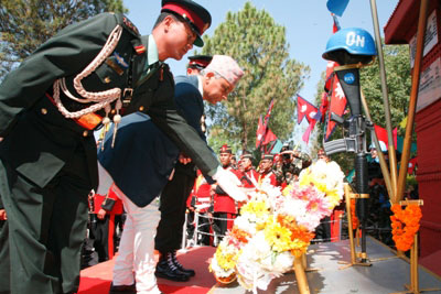TRIBUTE: PM Khil Raj Regmi lays a wreath at the UN peace keeping martyrs monument in the opening of the exercise Shanti Prayas ll in Kavre on Monday.
