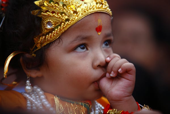 A little boy dressed up as Lord Krishna on the occasion of Krishna Janmashtami at Patan Darbar Square on Saturday. On this day devotees throng the Krishna temple to celebrate the birth of the Hindu deity.