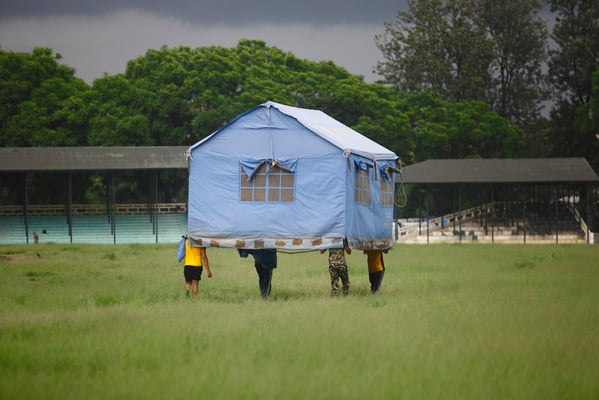 Nepal Army soldiers remove tents at Tundikhel on Thursday.