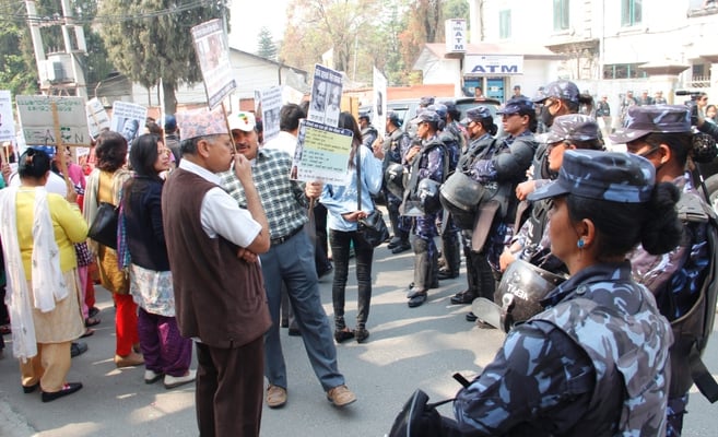 GOING STRONG : People show their solidarity on the 100th day of Occupy Baluwatar near prime minister's residence on Saturday.