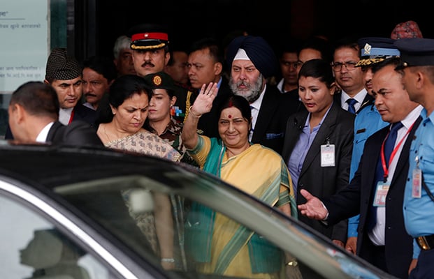 Indian foreign minister Sushma Swaraj arrives in Kathmandu on Thursday. Swaraj is in Nepal for the 15th Bay of Bengal Initiative for Multi-Sectoral Technical and Economic Cooperation (BIMSTEC) meeting. Also seen in the photo, Indian Ambassador to Nepal Manjeev Singh Puri.