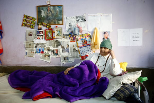 Ganga Maya Adhikari of Gorkha talks to journalists on Wednesday at Bir Hospital, where she has been on a prolonged hunger strike demanding justice for her son murdered allegedly by Maoist cadre. She warned of 'going to any extent for justice' after the Chitwan court postponed hearing on her case for the 19th time.