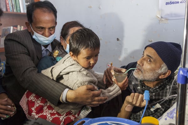 Dr Govinda KC ends his hunger strike on the 22th day following a 12-point agreement with the government on Sunday. He drank juice offered by a boy who had lost both of his parents in last year's earthquake.
