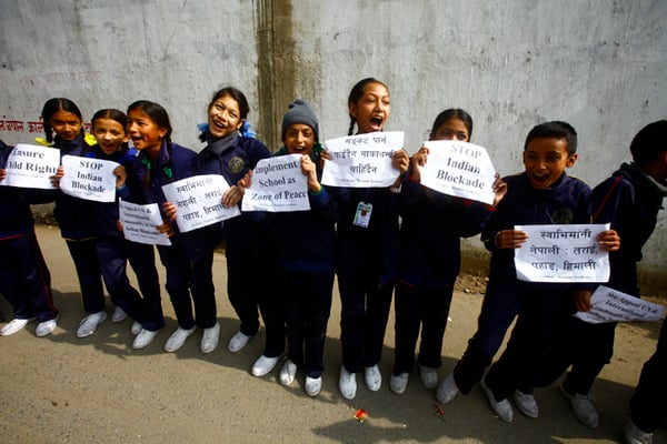 Students stand in line to form the longest human chain to protest against the Indian blockade at Kalanki on Friday.