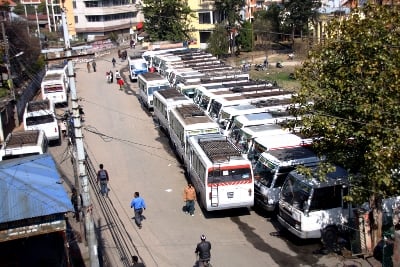 STAND STILL: The Lalitpur Yatayat Bus stop is full of parked buses which are not operating due to the bandh called by the CPN-M in Patan Dhoka, Tuesday afternoon.